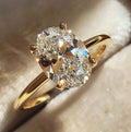 Center Oval Diamond Ring