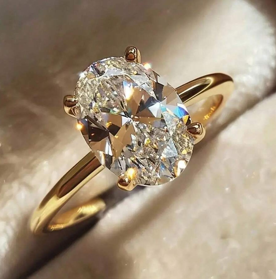 Center Oval Diamond Ring